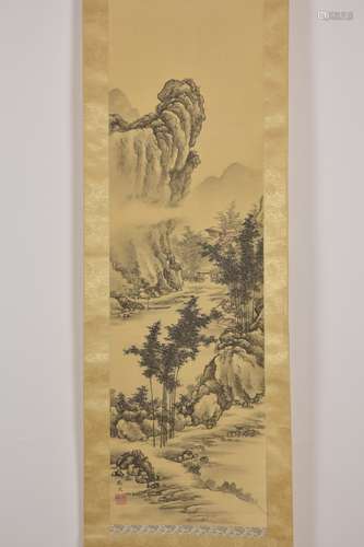 A Japanese ink painting in scroll depicting a moun