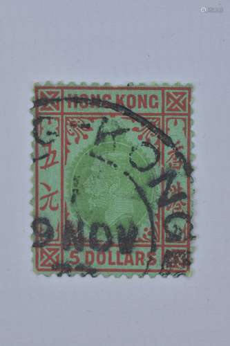 A used lightly mounted Hong Kong red and emerald Five dollar stamp with King George VI.