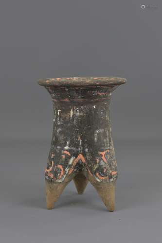 A Chinese Han dynasty grey pottery vessel with pai