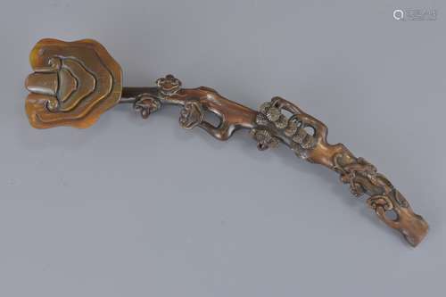 A Chinese carved horn Ruyi sceptre possibly Qing d