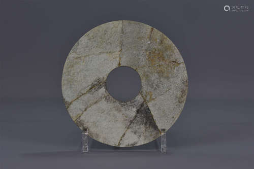 A Chinese Han Dynasty jade disc. 17cm diameter