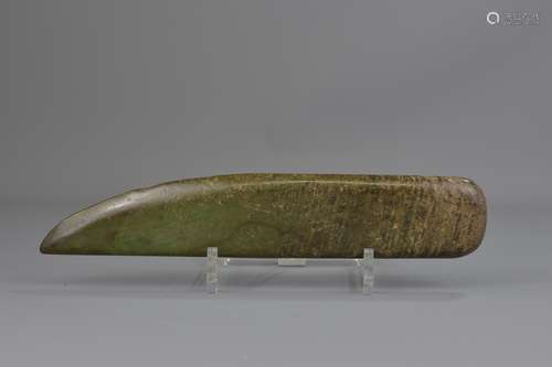 A Chinese ceremonial jade axe head. 28 cm length.