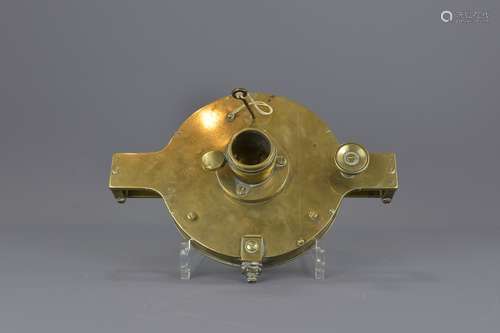 A Victorian polished- bronze measuring instrument