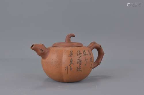 A Chinese Yixing pottery tea pot with inscription