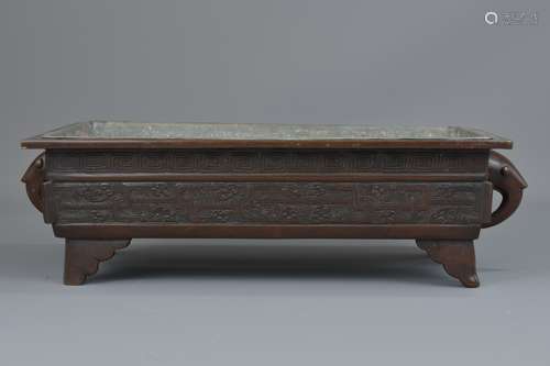 A Chinese 19th century rectangular bronze censer.