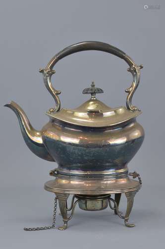 A Victorian silver plated Trivet kettle with burne