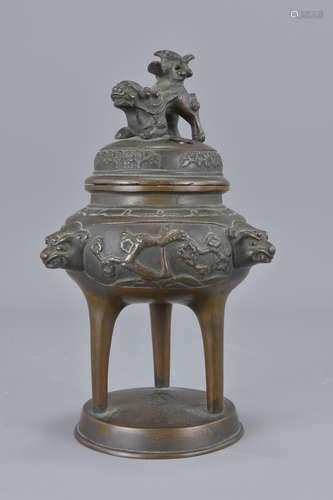 A Chinese bronze insense burner with 4 character m