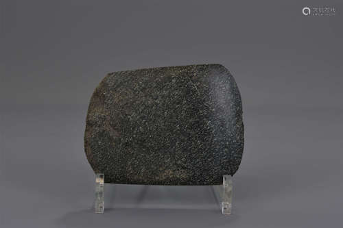 A Chinese Neolithic stone axe head. 10x12cm