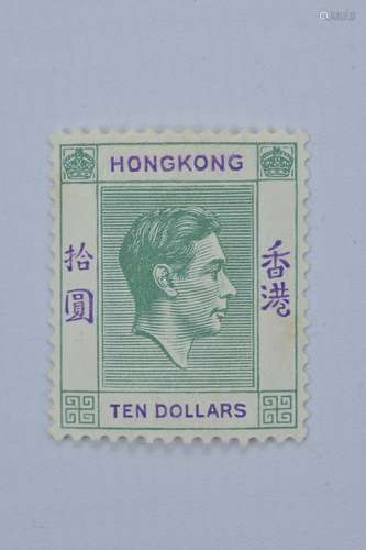 A mint condition Hong Kong green and purple Ten dollar stamp with King George VI. Excellent conditio