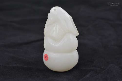 A Chinese carved jade rabbit. 8 cm.