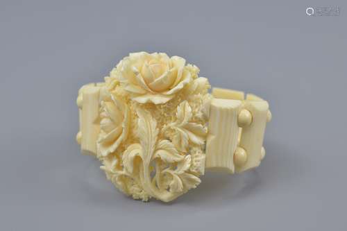 A Victorian Ivory bracelet carved with floral design