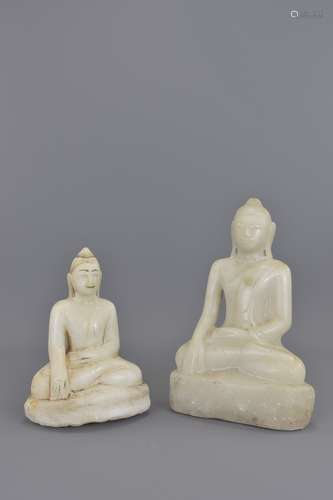 Two Cambodian 19th century marble seated buddhas.