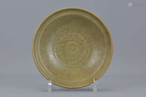 A Chinese Ming Dynasty celedon dish. 18.5 cm diame