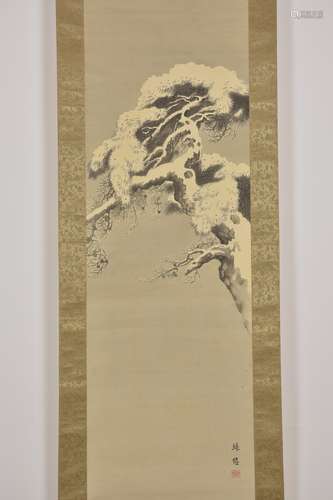 A Japanese ink painting in scroll depicting a pine