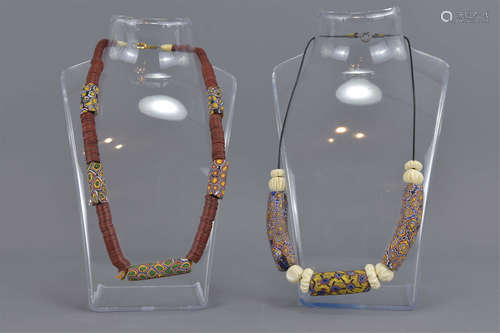 Two Venetian glass bead necklaces one with red cin