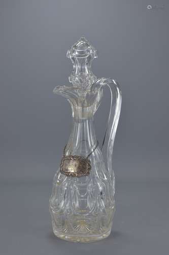 A Victorian Claret jug with stopper and silver win