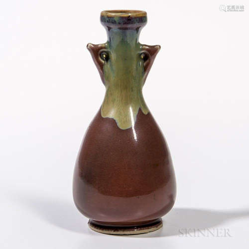 Small Liver Red-glazed Vase, China, 19th/20th century, elongated pear shape with slender neck and dish-shaped mouth, with stylized hand