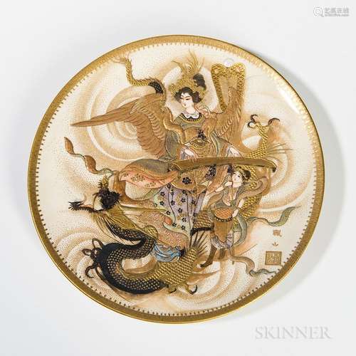 Fuzan Satsuma Plate, Japan, late 19th century, depicting a winged goddess playing the zither, riding on a dragon with a boy, the unders