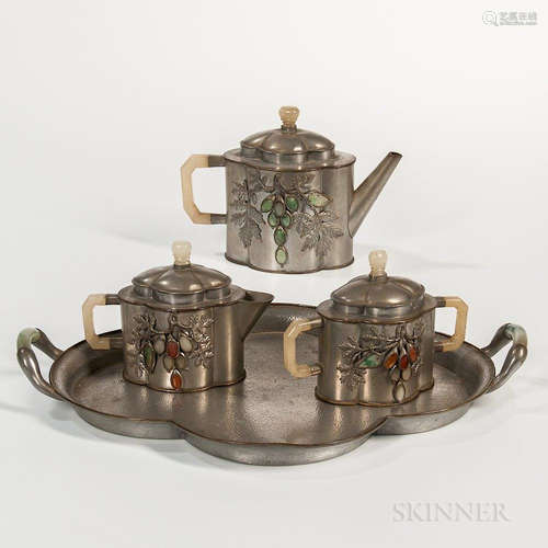 Export Pewter Tea Set with Tray, China, late Qing dynasty, all elongated quatrefoil form, decorated with hardstone-inlaid grape vine de