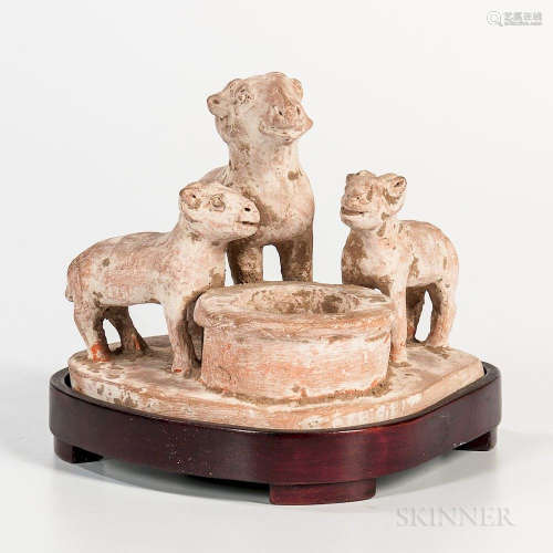 Tomb Pottery Figural Goat Group, China, red earthenware with traces of pigment, depicting three goats at a well, with stand, ht. 6 in.P