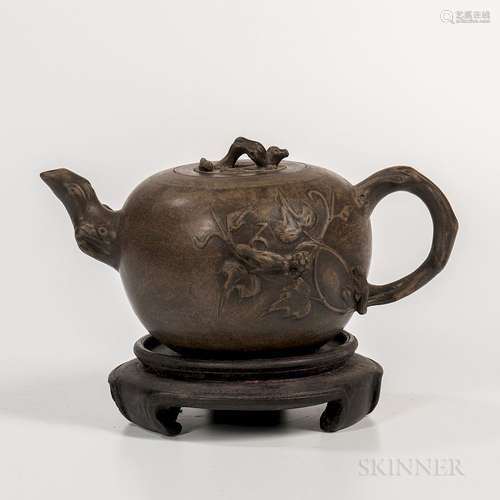 Gray Yixing Teapot, China, 20th century, globular form with a strainer, decorated with applied grapevine and squirrel design, 