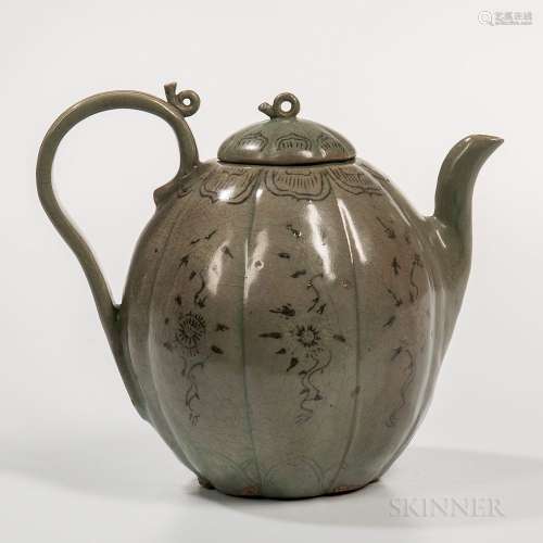 Celadon Sanggam Inlaid Ewer and Cover, Korea, possibly 13th century, eight-lobed melon-shape, with strap handles, decorated with chrysa