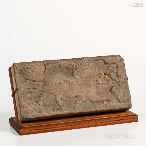 Tomb Pottery Tile, China, gray earthenware depicting a mythical beast in low relief, with stand, lg. 11, ht. 5 1/2 in.