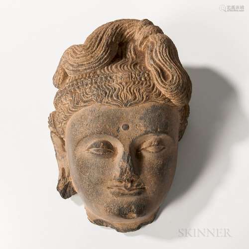Gandharan Gray Schist Bodhisattva Head, Kushan period, possibly 2nd/3rd century, well carved with full lips, heavy lidded eyes with fin