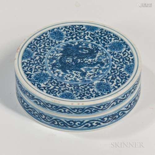 Blue and White Covered Box, China, 19th century, circular form decorated with a dragon-and-cloud in a double ring encircled with a broa