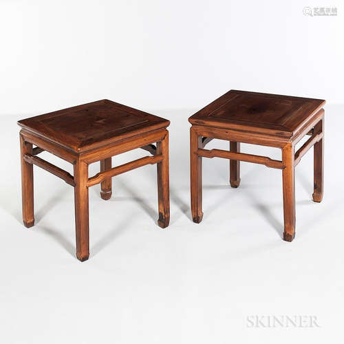 Pair of Hardwood Corner-leg Stools, China, 20th century, wood panels set in rectangular frames, concave waists, beaded aprons and legs