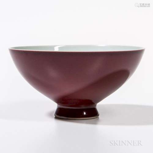 Sang-de-Boeuf Bowl, China, 18th century, upturned douli shape on short splayed foot, white-glazed interior, six-character Qianlong mark