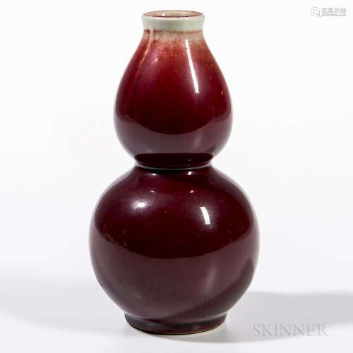 Flambe Double Gourd Vase, China, 19th/20th century, decorated with crushed raspberry red glaze thinning at the mouth rim, four-characte