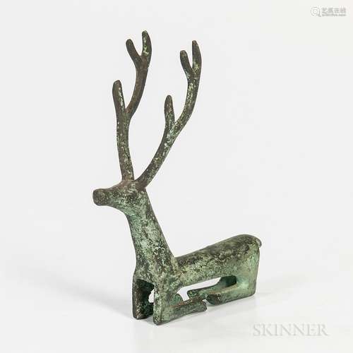 Bronze Stag Fitting, Luristan, the animal recumbent with its legs tucked under itself, elongated neck and body, ht. 4 1/8 in.