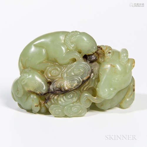 Jade Carving of a Ram, China, seated with two baby rams and a pile of lingzhi mushrooms in front, yellowish celadon stone mottled with