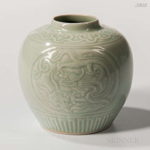 Celadon-glazed Jar, China, 20th century, bulbous form with short raised neck, on a bisque foot ring with recessed base, decorated with