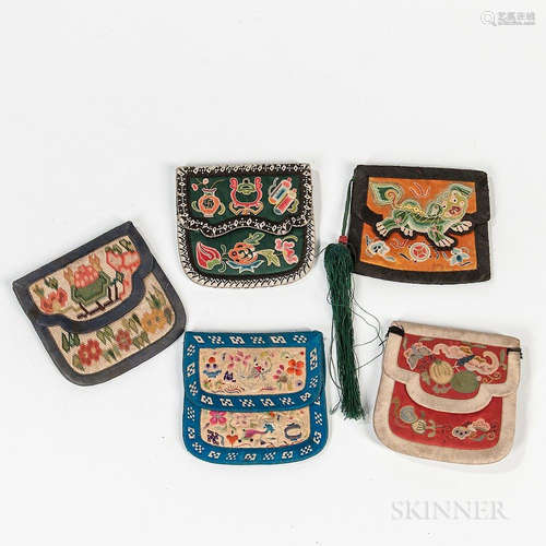 Five Embroidered Purses, China, 20th century, one embroidered with a shishi lion, one embroidered with creatures from a folk tale, one