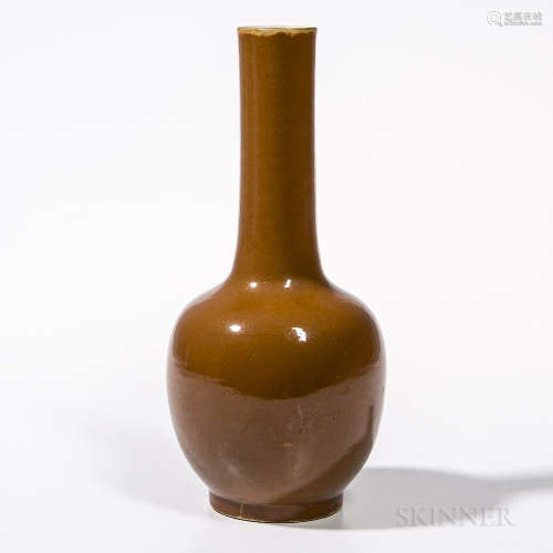 Brown-glazed Bottle Vase, China, 19th/20th century, oval form with long slender neck, on a short raised foot, white-glazed interior and