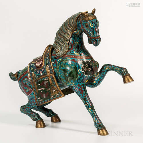 Cloisonne Horse, China, 20th century, with its hind legs lowered and the left leg in the air, decorated with archaic motifs against a t