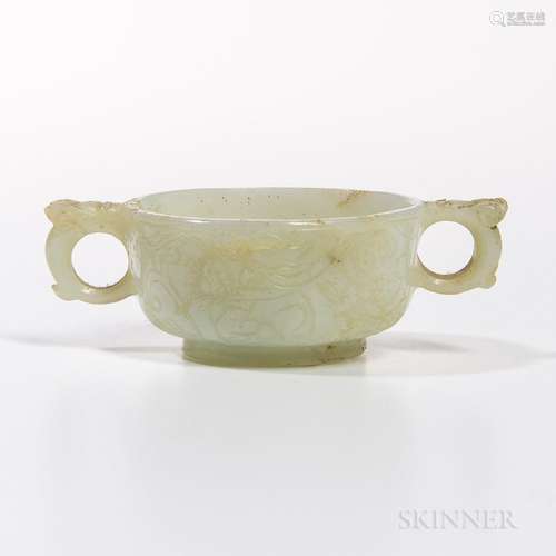 Jade Cup with Dragon Handles, China, 20th century, the round dragon handles meld with the incised scrolling exterior band of flowers an