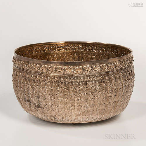 Large Sterling Silver Repousse Festival Bowl, Thailand, 20th century, decorated with a chased floral roundel, a silver mark in Thai on