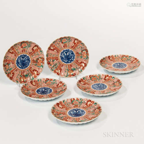 Set of Six Imari Chrysanthemum Dishes, Japan, 19th/20th century, each petal decorated in red, green, and gold enamels, with a phoenix r