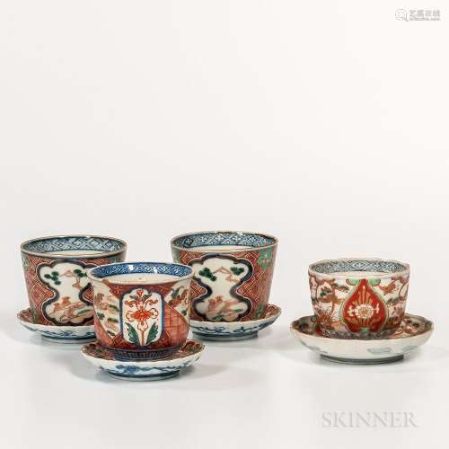 Eight Imari Cups and Dishes, Japan, 19th/20th century, a pair of cups with slanted sides; three small chrysanthemum saucers with a phoe