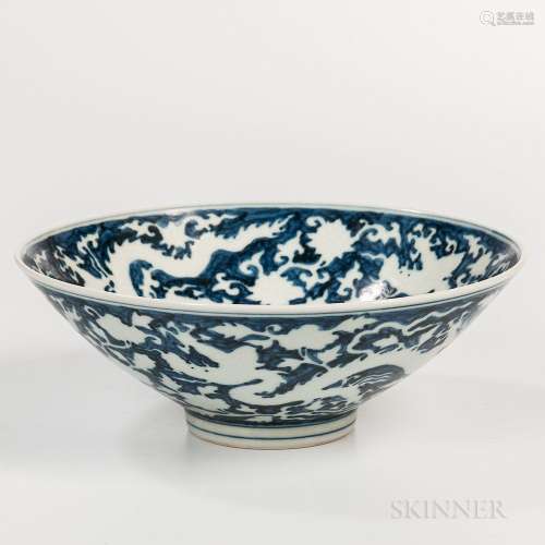 Large Blue and White Bowl, China, Ming dynasty style, decorated with white dragons in the well, interior, and exterior, incised details