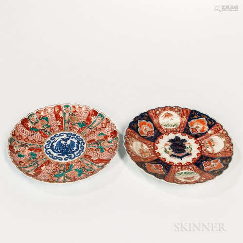 Two Imari Dishes, Japan, 19th/20th century, a chrysanthemum dish with a phoenix roundel in underglaze blue, 