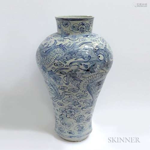 Blue and White Dragon Jar, Korea, late 19th century, with high neck and foot, decorated with a four-clawed dragon amongst clouds, ht. 2