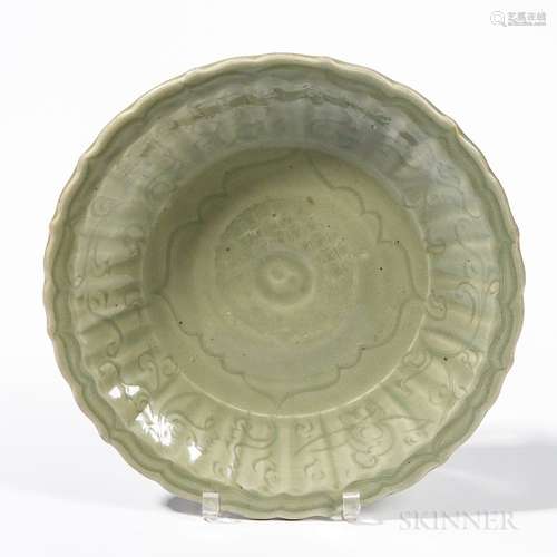 Longquan Celadon Dish, China, Ming dynasty style, with barbed rim, the ribbed cavetto decorated with incised floral design, ht. 2 1/8,