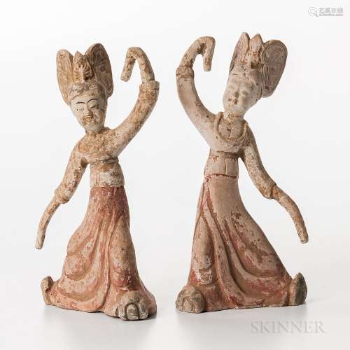 Two Tomb Pottery Figures, China, each dancing figure with flowing robes and elaborate headdress, with traces of pigment, ht. to 11 1/2