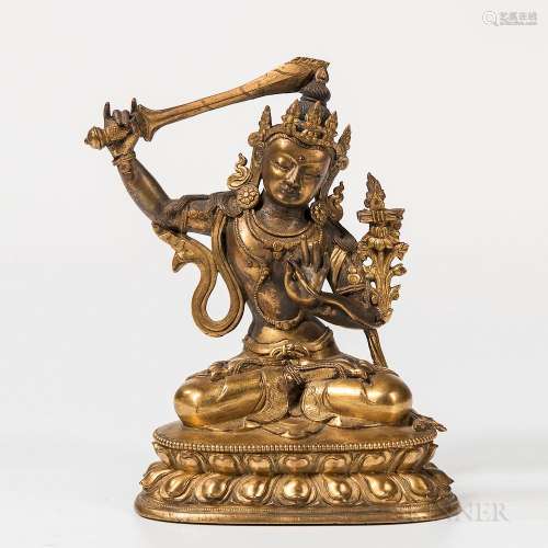 Gilt-bronze Figure of Manjushri, Sino-Tibet, 18th century or earlier, seated in dhyanasana on a double-lotus throne, holding a sword in