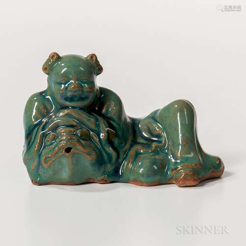 Green/Blue-glazed Water Dropper, China, Ming dynasty style, in the shape of a deity reclining against a toad with his hands atop the to