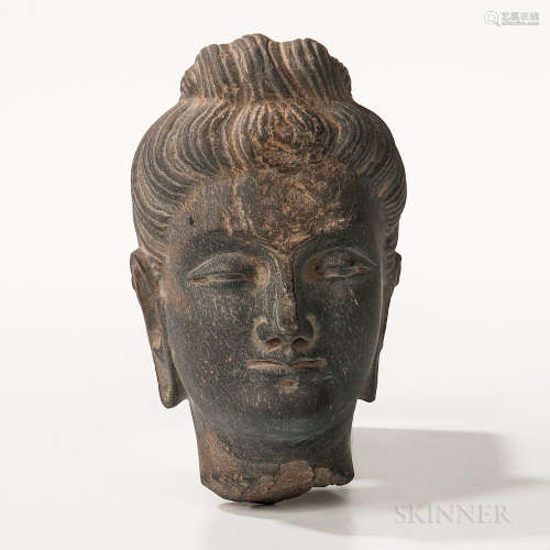 Gandharan Gray Schist Buddha Head, Kushan, possibly 2nd/3rd century, finely carved with heavy lidded eyes and full lips, the stone of h